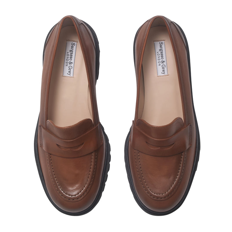 Casta branded loafers featuring a brown leather upper and a chunky platform sole Casta Josh chunky platform loafers brown suede tan patent  main image 3