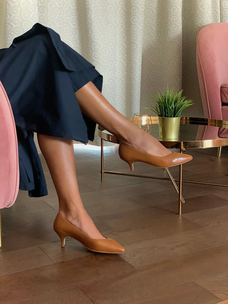 Image displaying tan mid heel shoes